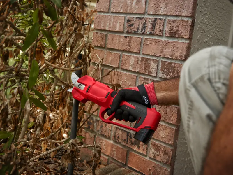 Pruning shears being maintained after garden work